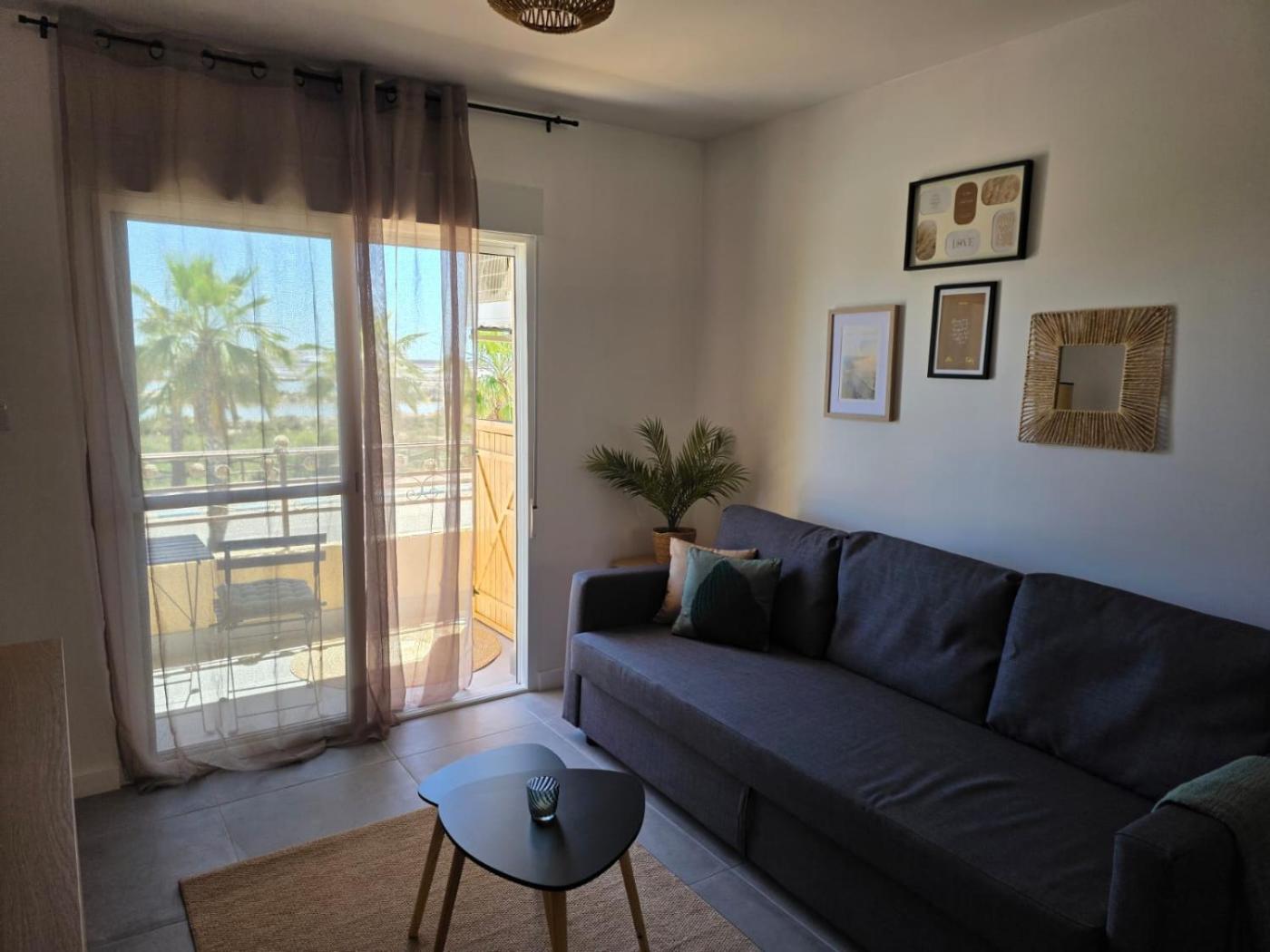 Living room opening to the balcony